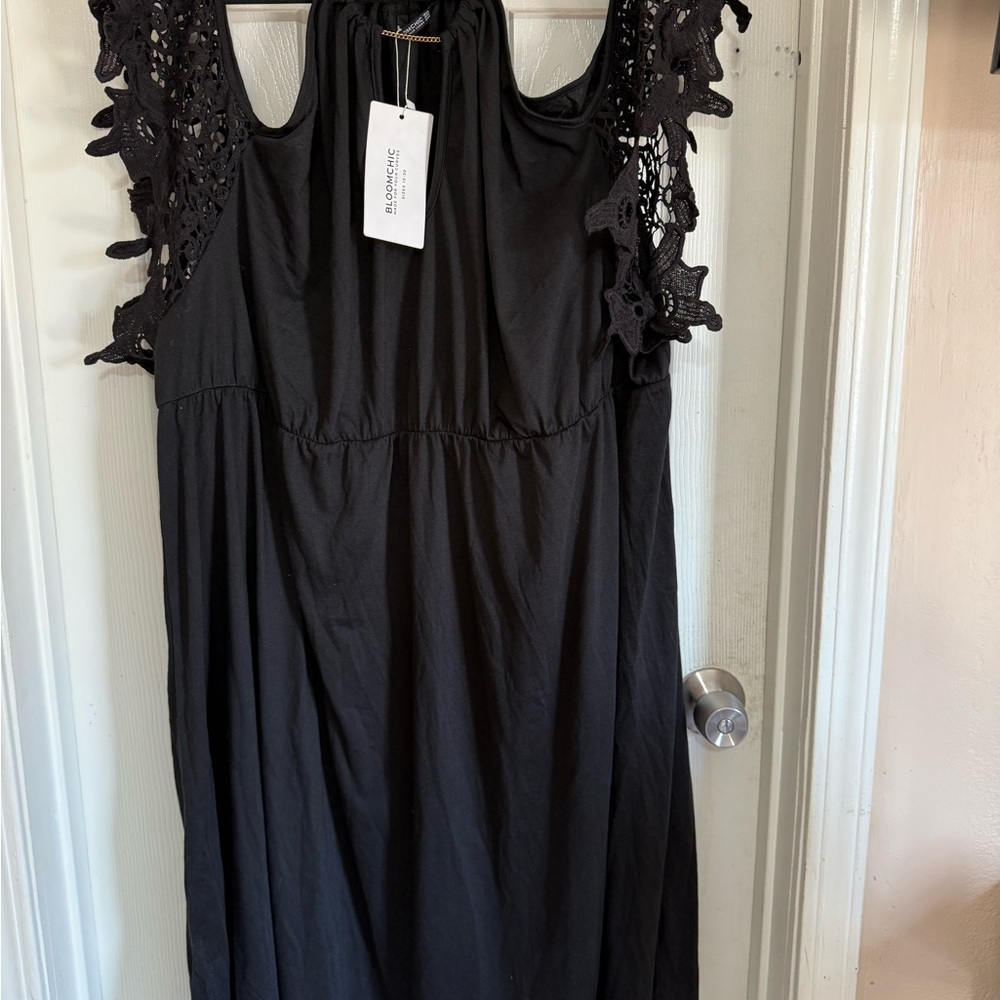 BloomChic Black Dress with Gold Chain Accent